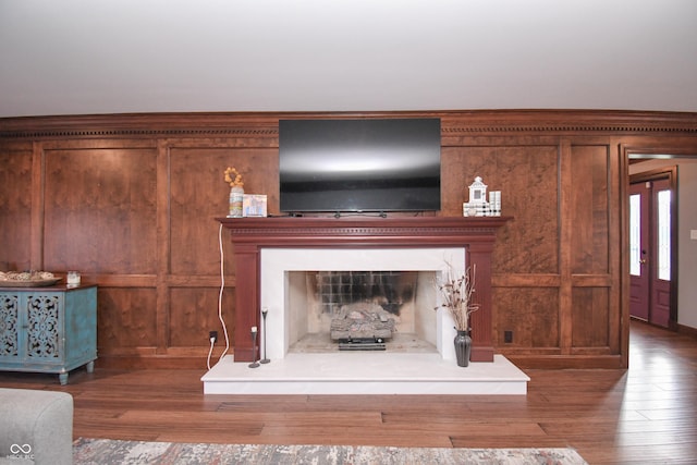 unfurnished living room featuring dark wood-type flooring