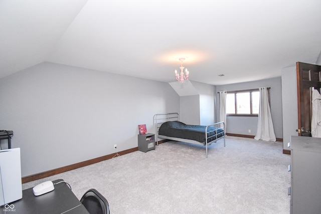 bedroom with light colored carpet, lofted ceiling, and a notable chandelier