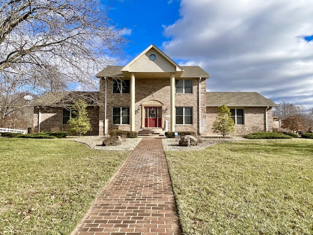 front facade with a front yard