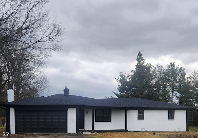 6805 E County Road 100 S, Avon, IN 46123 - ranch-style home featuring brick siding, a chimney, an attached garage, and roof with shingles