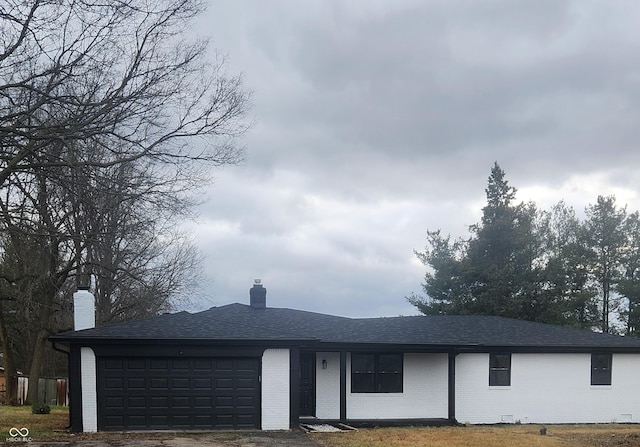 6805 E County Road 100 S, Avon, IN 46123 - ranch-style house featuring brick siding, a garage, and a chimney