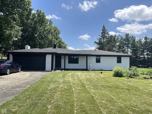 6805 E County Road 100 S, Avon, IN 46123 - ranch-style home featuring a garage, a front yard, asphalt driveway, and brick siding