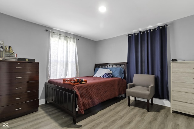 bedroom featuring light hardwood / wood-style floors