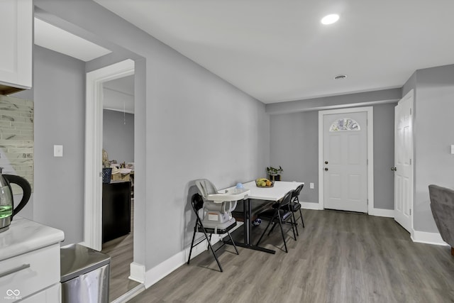 dining area featuring light wood-type flooring