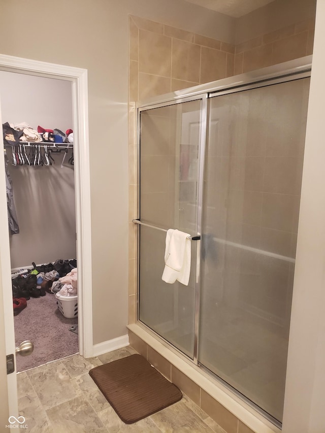 bathroom with an enclosed shower