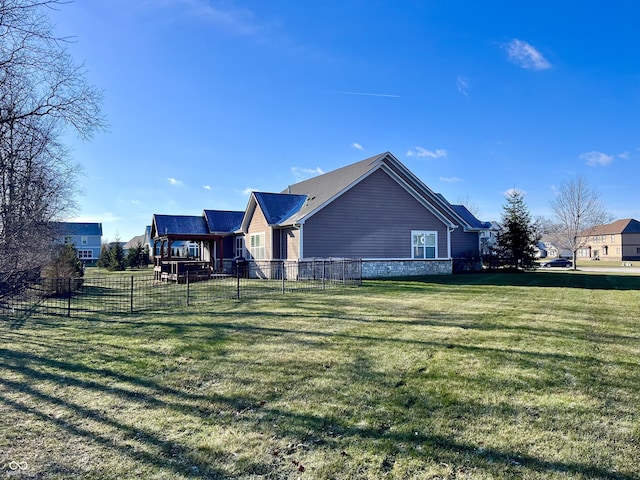 view of property exterior featuring a lawn