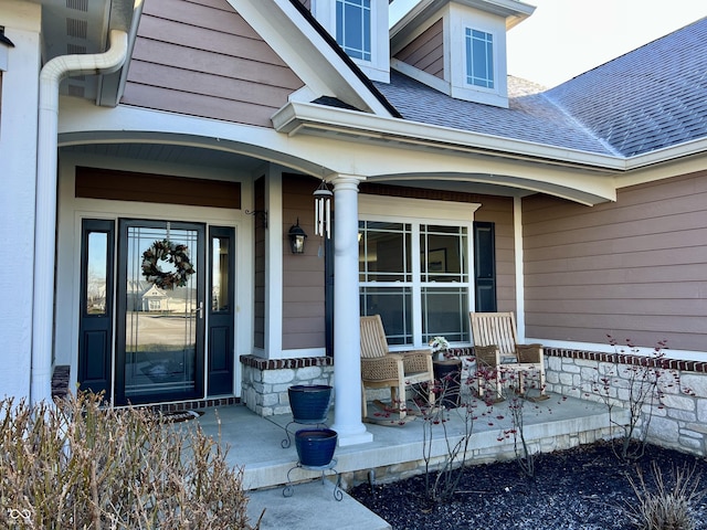 doorway to property with covered porch