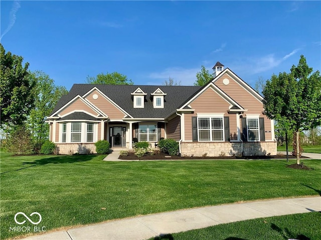 view of front of home with a front lawn