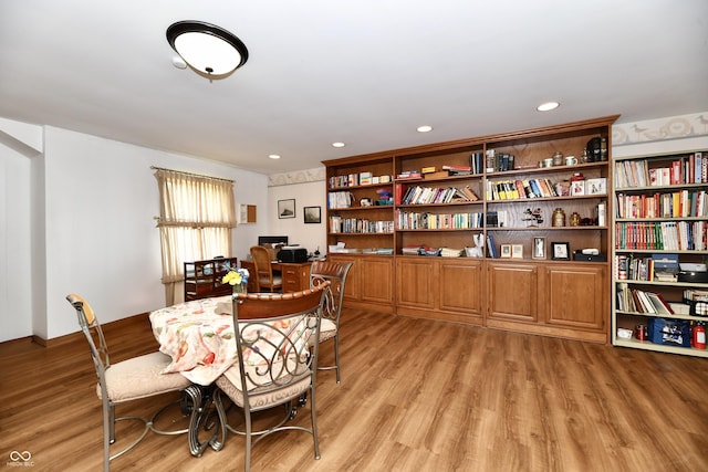 dining area with light wood-type flooring