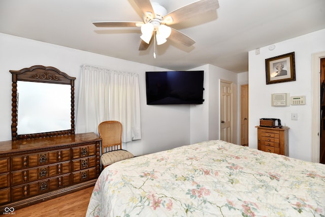 bedroom featuring ceiling fan and light wood-type flooring