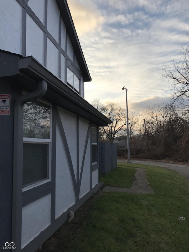 view of property exterior at dusk