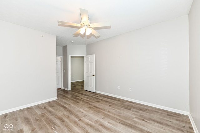 unfurnished room featuring ceiling fan and light hardwood / wood-style flooring