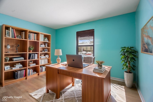 office area featuring light wood-type flooring