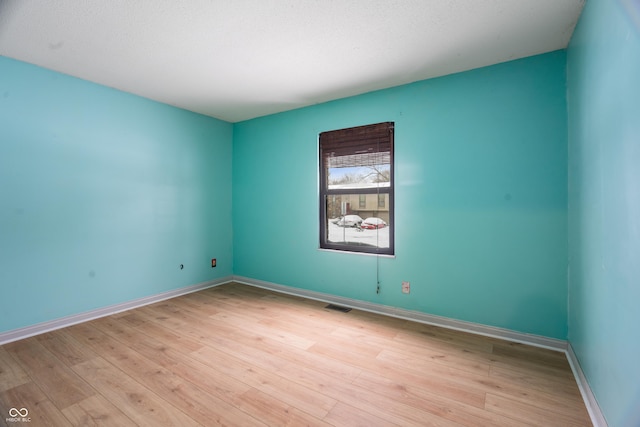 empty room featuring light wood-type flooring