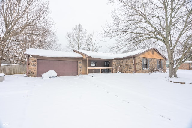 ranch-style home featuring a garage