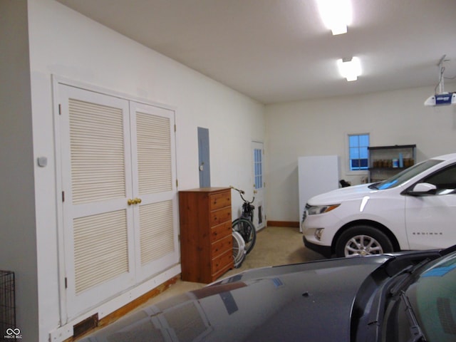 garage featuring a garage door opener