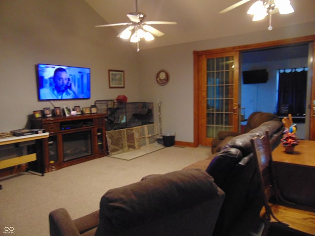 living room featuring carpet and ceiling fan