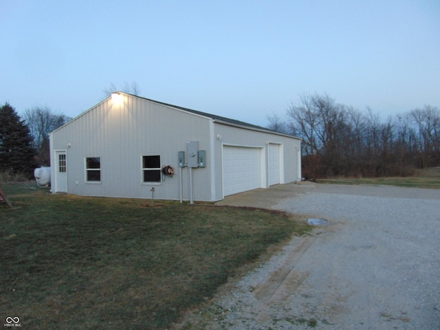 garage with a yard