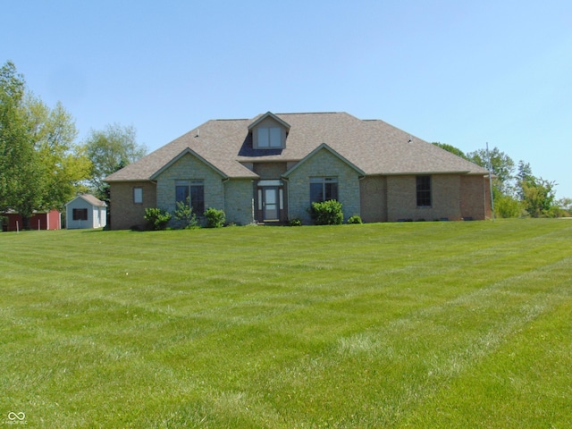 7099 S 1100 W, Jamestown, IN 46147 - view of front of home with a front lawn, stone siding, and roof with shingles