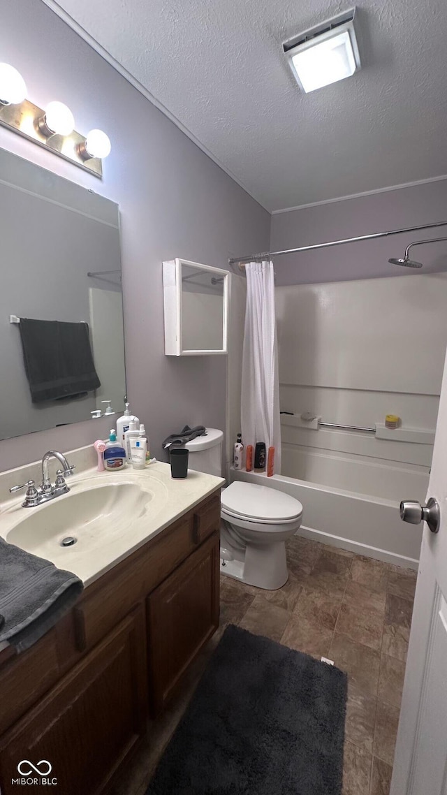 full bathroom featuring vanity, shower / tub combo, a textured ceiling, and toilet