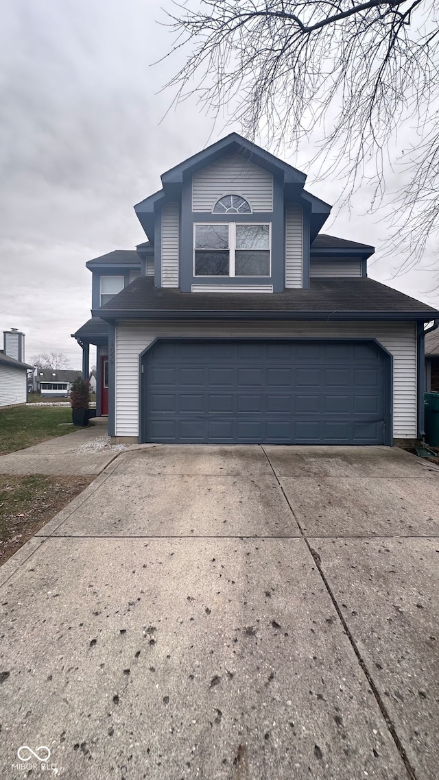 view of front of home with a garage