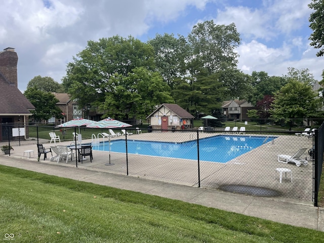 8021 E 20th St, Indianapolis, IN 46219 - community pool featuring a patio