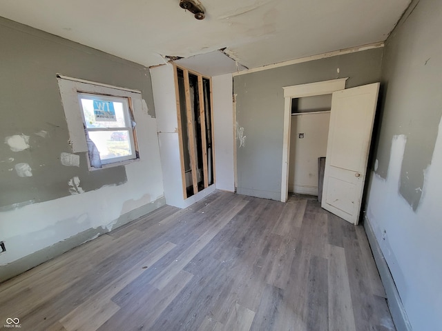 unfurnished bedroom with light hardwood / wood-style flooring