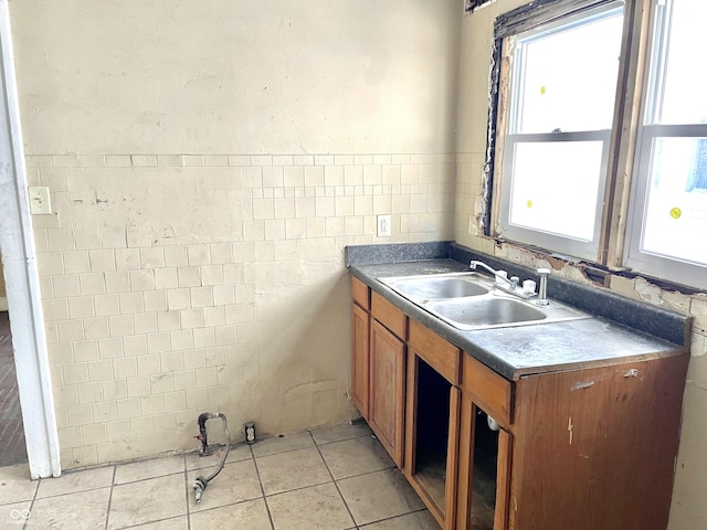 bathroom featuring tile patterned flooring and sink