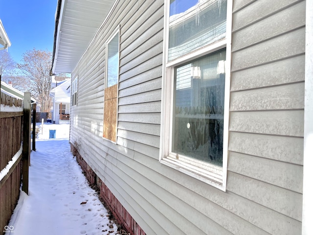 view of snow covered property