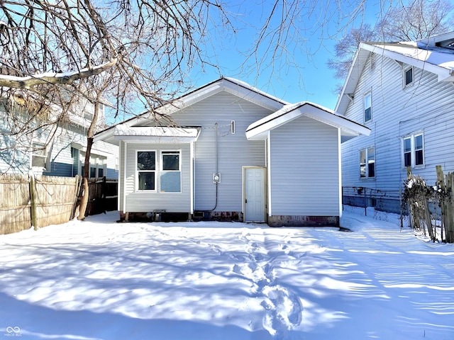 view of snow covered house