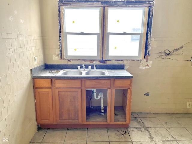 bathroom featuring tile patterned flooring and vanity