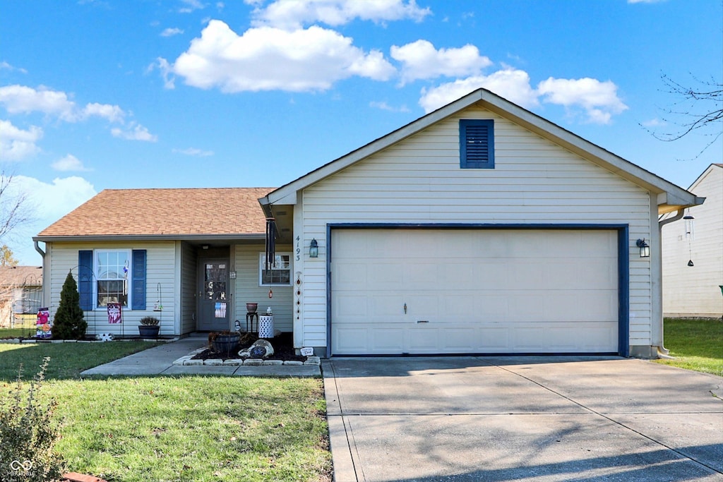 single story home with a front lawn and a garage