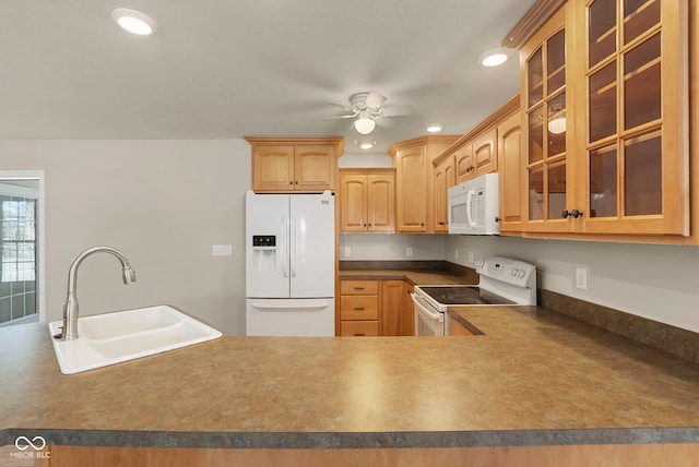 kitchen featuring white appliances, ceiling fan, and sink