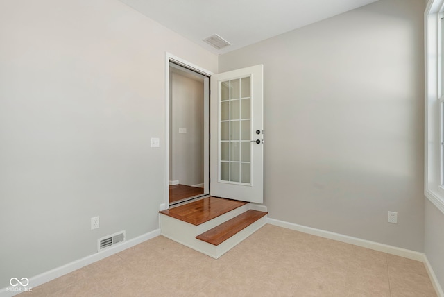 unfurnished room with a wealth of natural light