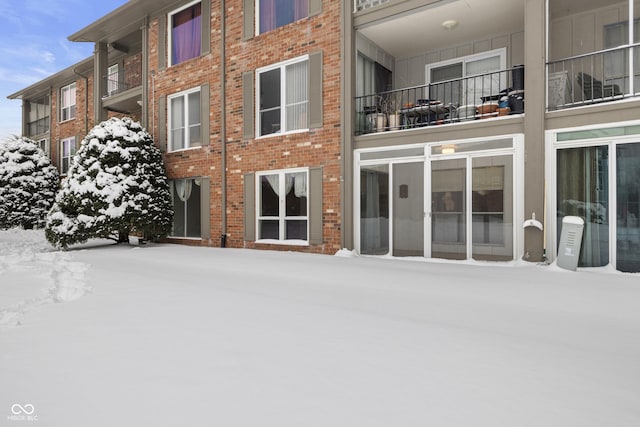 view of snow covered property