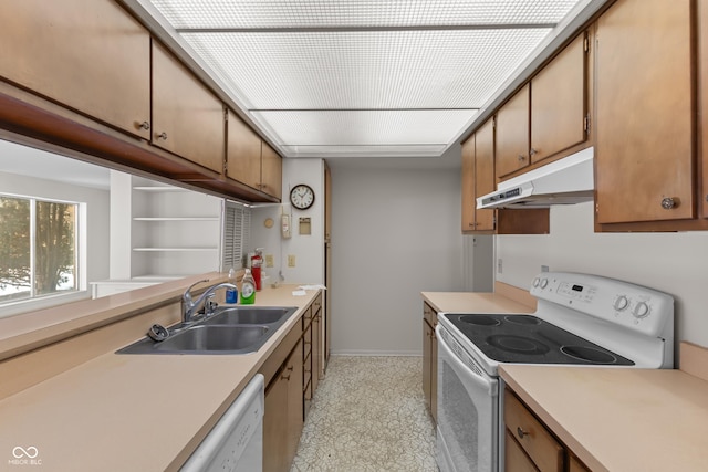 kitchen with sink and white appliances