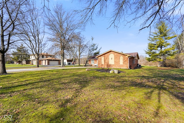 view of yard with a garage