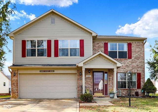 view of front of property featuring a garage