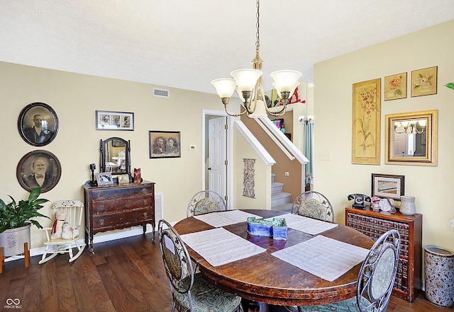 dining space with a notable chandelier and dark wood-type flooring