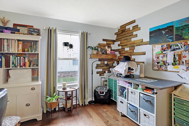 office featuring plenty of natural light and dark hardwood / wood-style floors