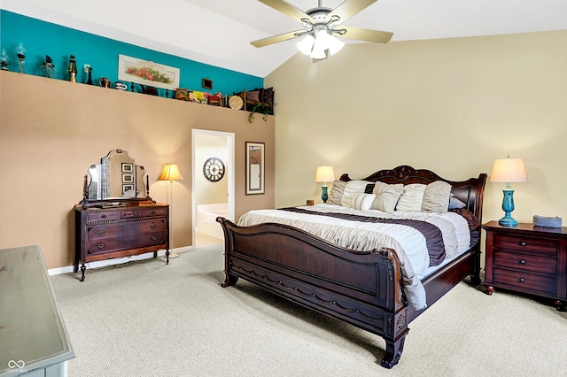 bedroom featuring connected bathroom, ceiling fan, carpet, and vaulted ceiling