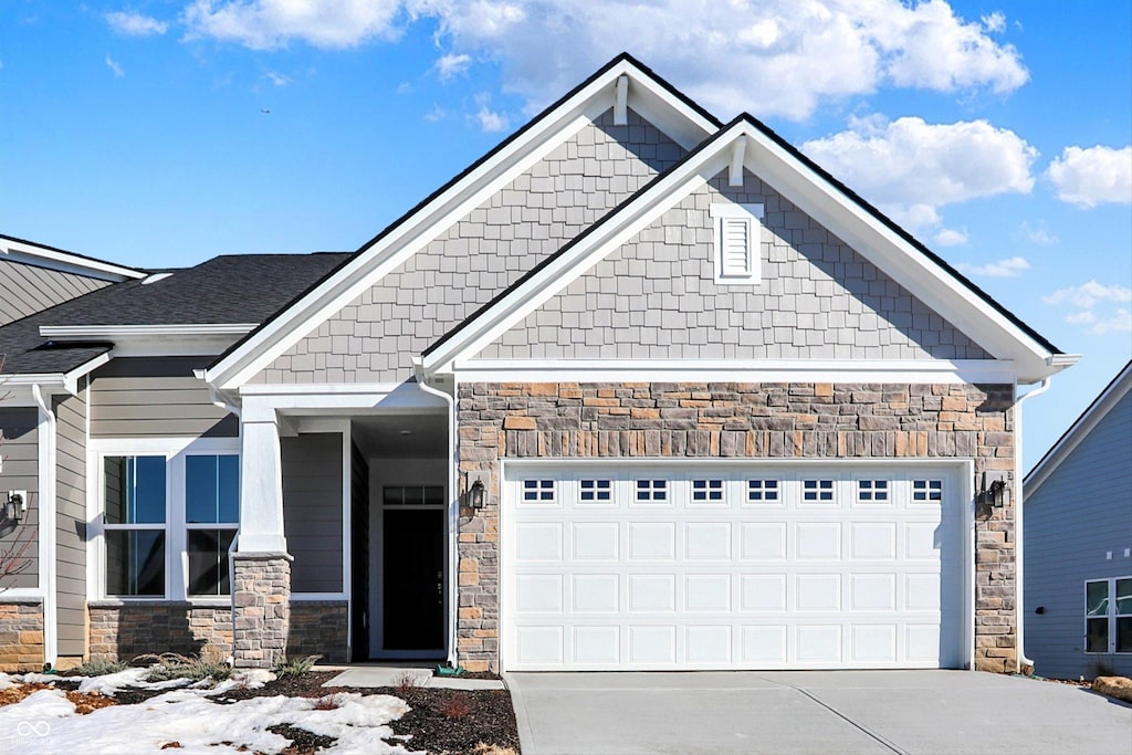 craftsman inspired home featuring a garage