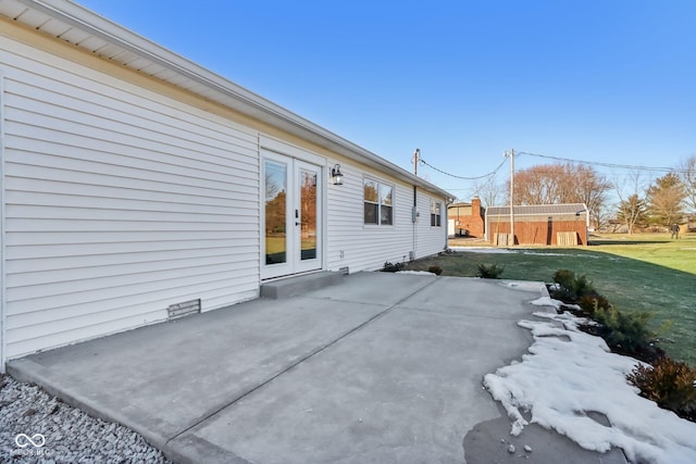 view of patio featuring french doors