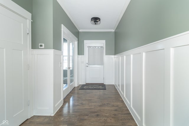 hall featuring dark hardwood / wood-style flooring, crown molding, and french doors