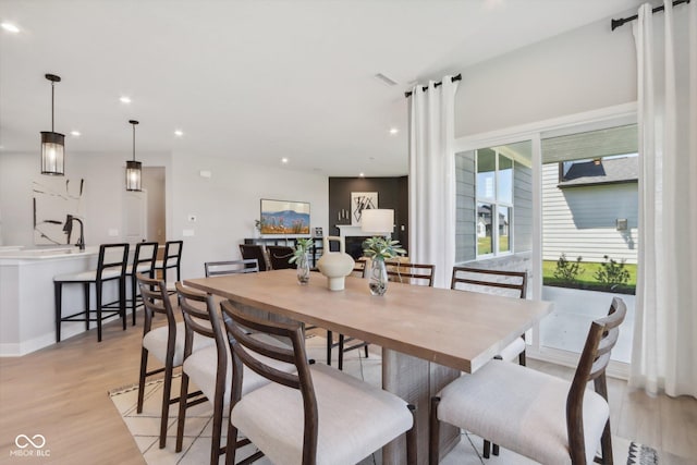 dining room featuring light hardwood / wood-style floors