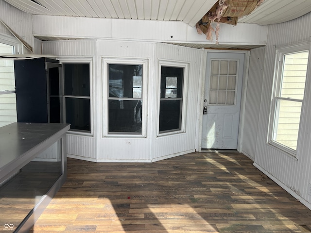 unfurnished sunroom featuring plenty of natural light