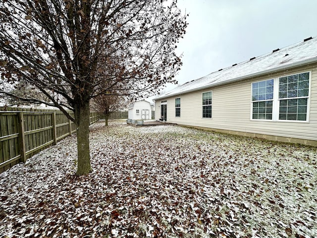 view of yard covered in snow