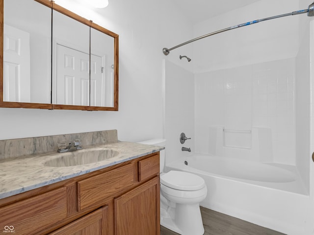 full bathroom featuring vanity, shower / bathtub combination, toilet, and wood-type flooring