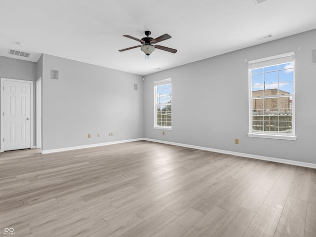 unfurnished room with light hardwood / wood-style floors and ceiling fan