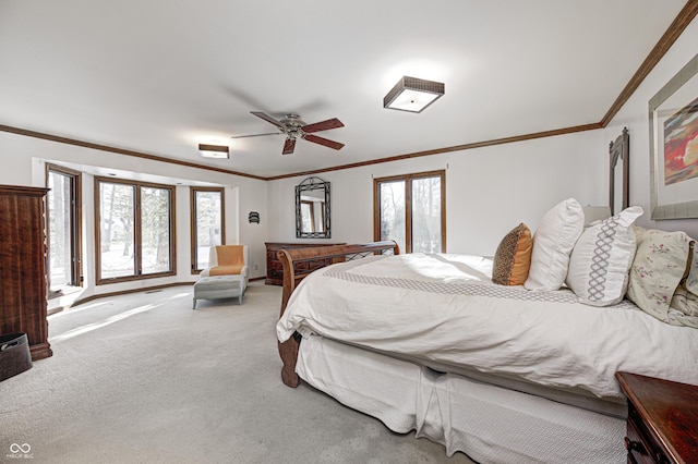 bedroom with ceiling fan, billiards, crown molding, and carpet floors